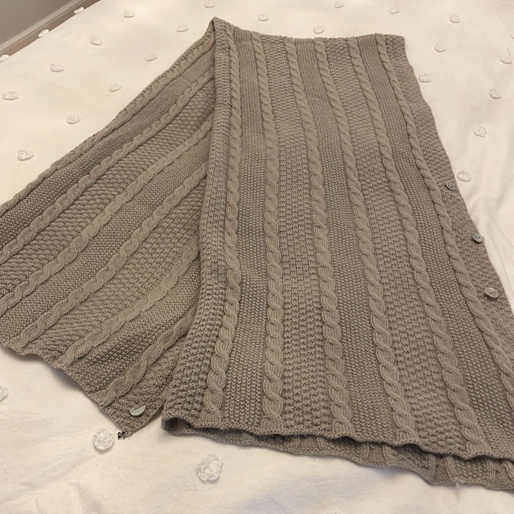 Grey knitted cable wrap